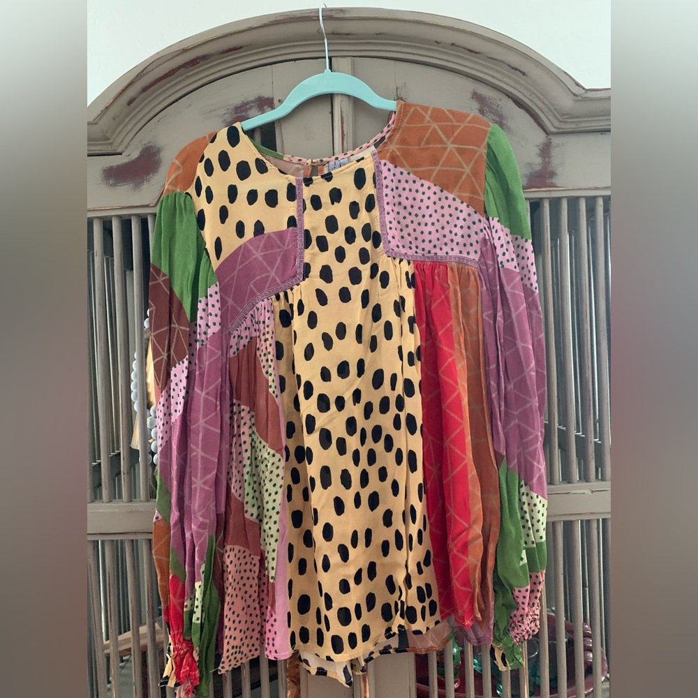 Anthropologie multi print shirt with ruffled sleeves